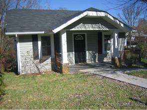 40 Substation Road Canton, NC 28716 - Photo 1 of 10 a view of a brick house with large windows