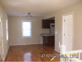40 Substation Road Canton, NC 28716 - Photo 5 of 10 a view of an empty room and kitchen