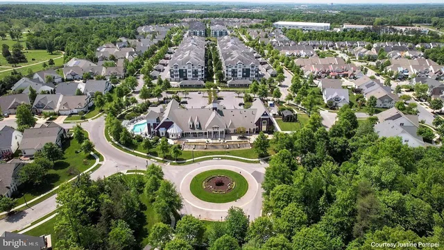 a view of a livingroom with furniture and windows