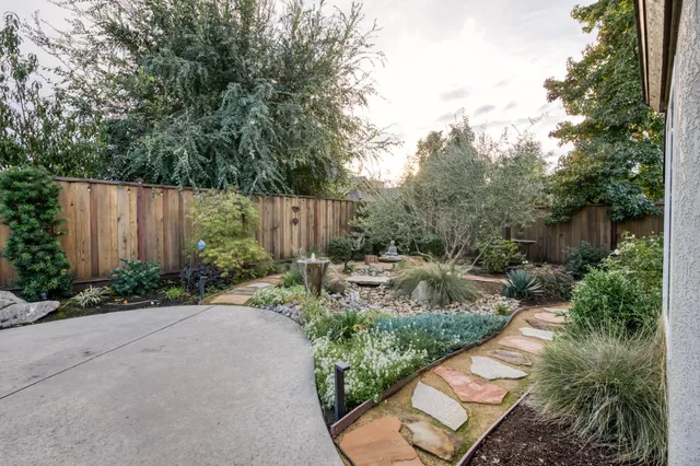 a view of a house with a tree