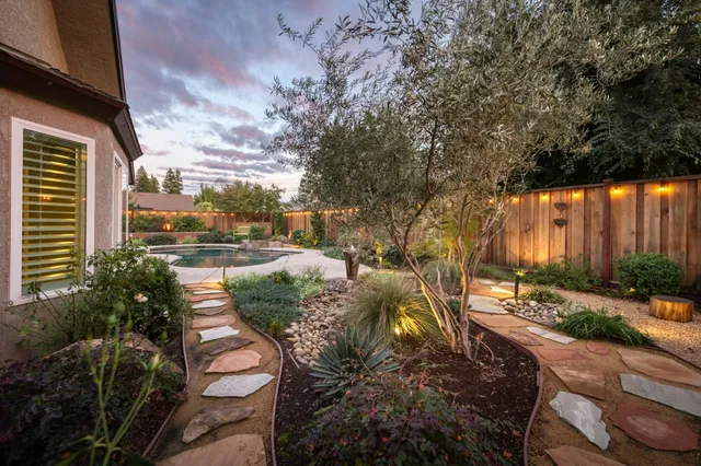 a view of a swimming pool with a patio