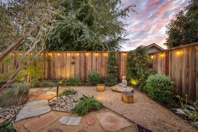 a view of swimming pool from a lake view