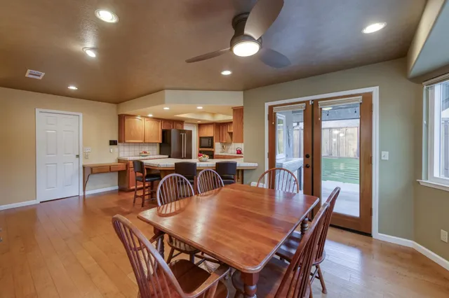 a view of a dining room with furniture