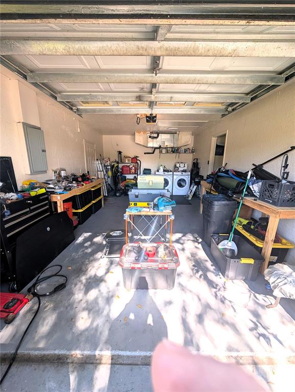 2775 25th Street Sarasota, FL 34234 - Photo 20 of 23 a living room with lots of furniture and a chandelier