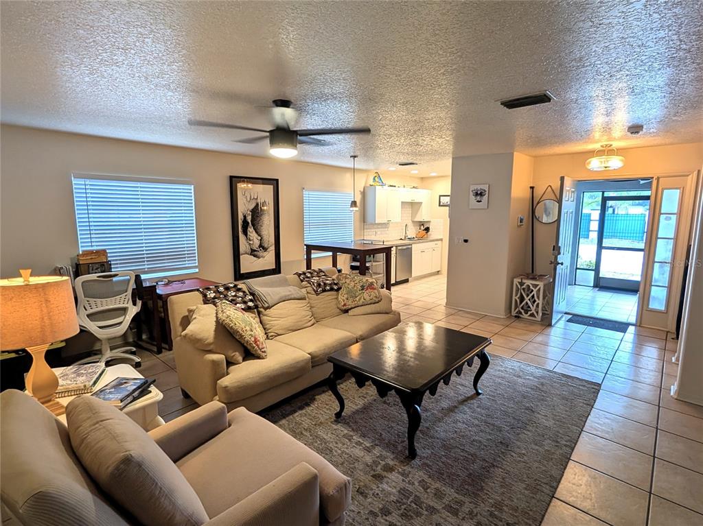 2775 25th Street Sarasota, FL 34234 - Photo 5 of 23 a living room with furniture and wooden floor