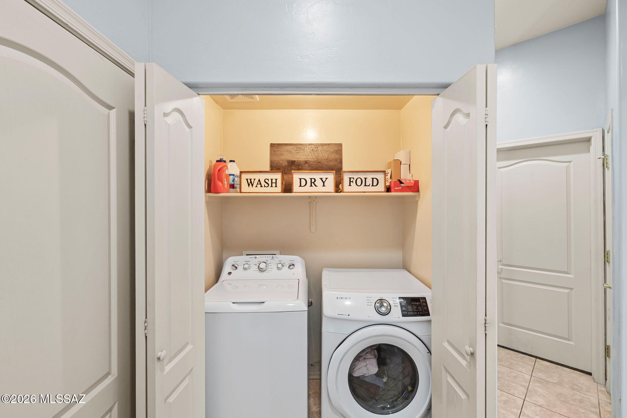 10461 South Stampede Ranch Court Vail, AZ 85641 - Photo 33 of 46 Laundry in hallway