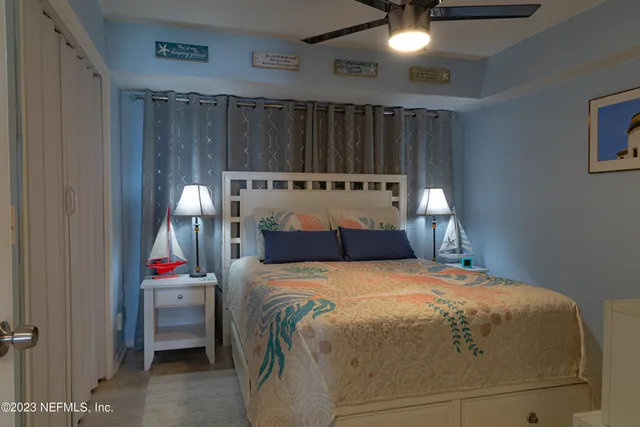 a bedroom with a bed and a closet