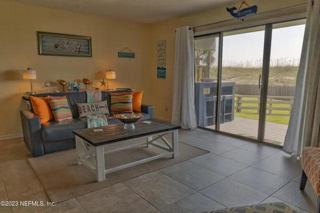 a view of a livingroom with furniture and a couch