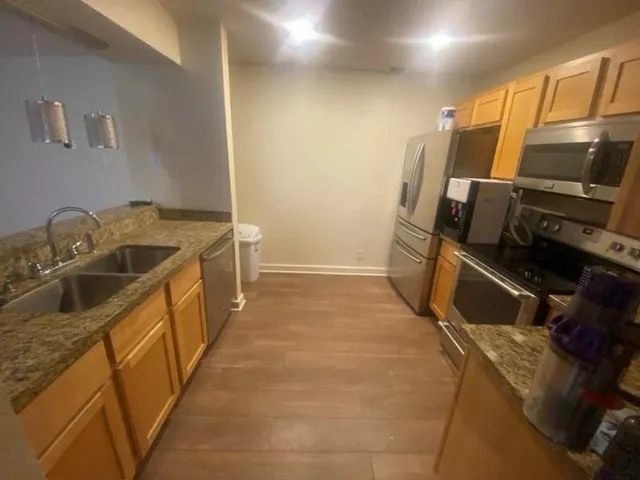 a bathroom with a sink and washing machine