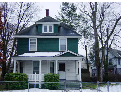 25 Trillium Street Springfield, MA 01108 - Photo 1 of 17 a front view of a house with a yard
