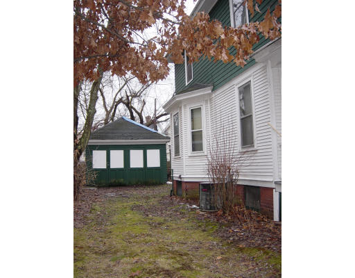 25 Trillium Street Springfield, MA 01108 - Photo 5 of 17 a view of a house with a yard