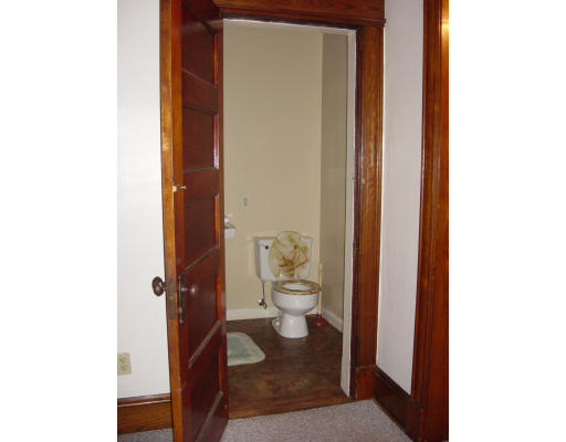 25 Trillium Street Springfield, MA 01108 - Photo 9 of 17 a bathroom with a granite countertop toilet and a shower