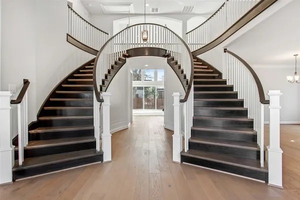 a view of entryway with wooden floor