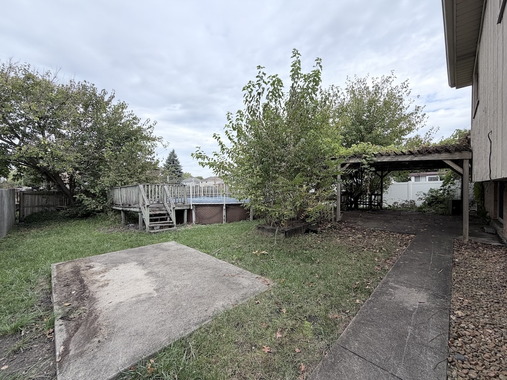 3312 192nd Place Lansing, IL 60438 - Photo 18 of 18 a view of a house with a yard