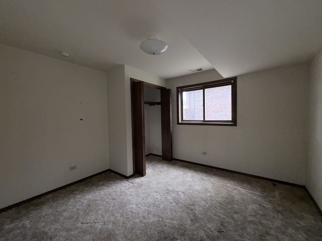 3312 192nd Place Lansing, IL 60438 - Photo 10 of 18 an empty room with windows