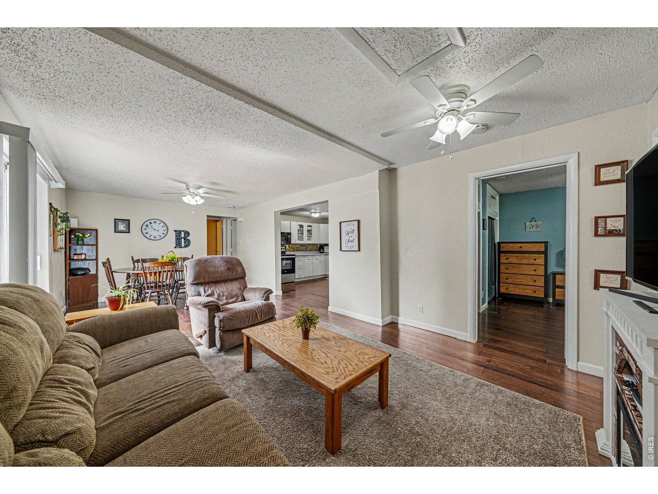 1430 30th Street Road Greeley, CO 80631 - Photo 3 of 22 a living room with furniture