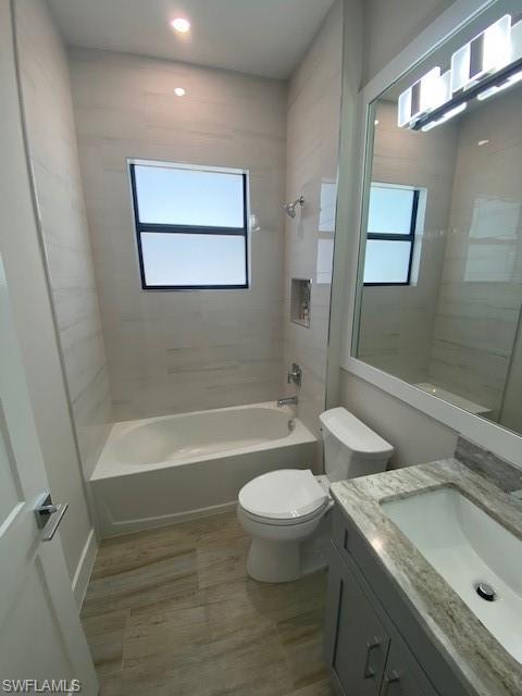 10 Willoughby Drive Naples, FL 34110 - Photo 11 of 11 a bathroom with a sink toilet and bathtub