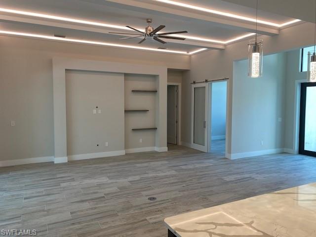 10 Willoughby Drive Naples, FL 34110 - Photo 5 of 11 a view of an empty room