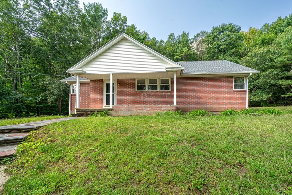412 Worcester Road Barre, MA 01005 - Photo 1 of 31 a front view of house with yard and green space
