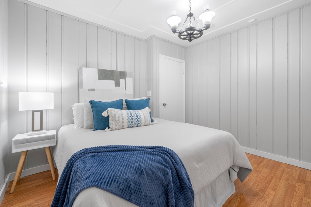 412 Worcester Road Barre, MA 01005 - Photo 17 of 31 a bedroom with a bed and a table