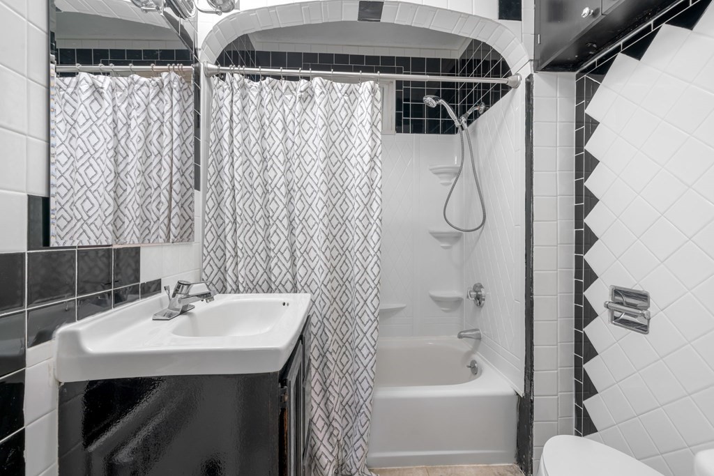 412 Worcester Road Barre, MA 01005 - Photo 19 of 31 a bathroom with a shower curtain and a sink