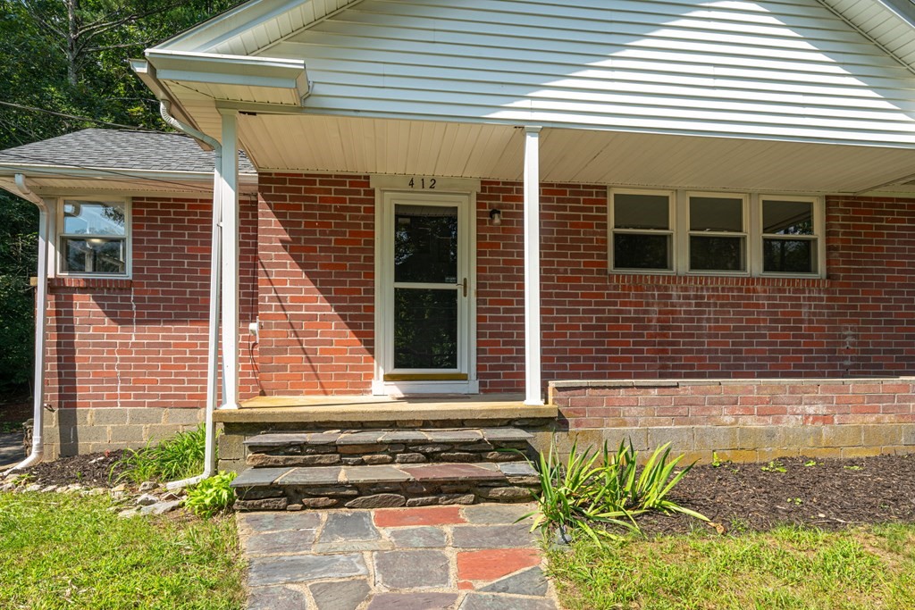 412 Worcester Road Barre, MA 01005 - Photo 2 of 31 a front view of a house with a yard