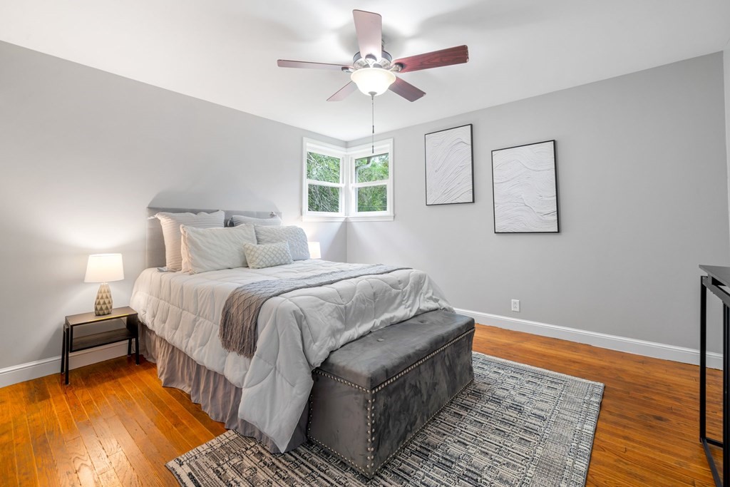 412 Worcester Road Barre, MA 01005 - Photo 23 of 31 a bedroom with a large bed rug and window