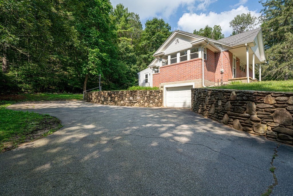 412 Worcester Road Barre, MA 01005 - Photo 28 of 31 a front view of a house with a yard