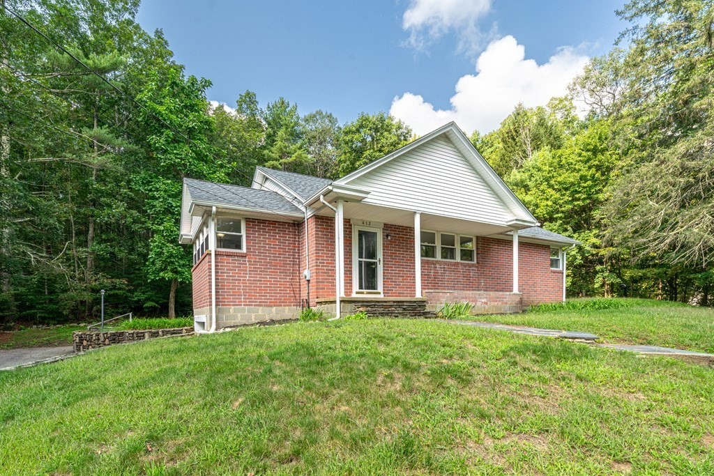 412 Worcester Road Barre, MA 01005 - Photo 29 of 31 a front view of house with yard and green space