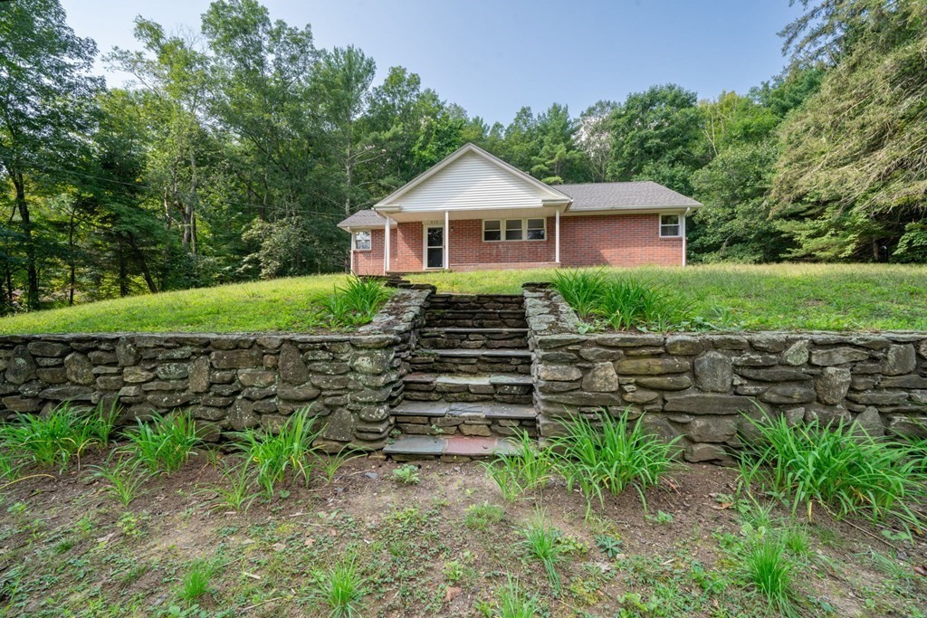 412 Worcester Road Barre, MA 01005 - Photo 30 of 31 a front view of a house with a yard