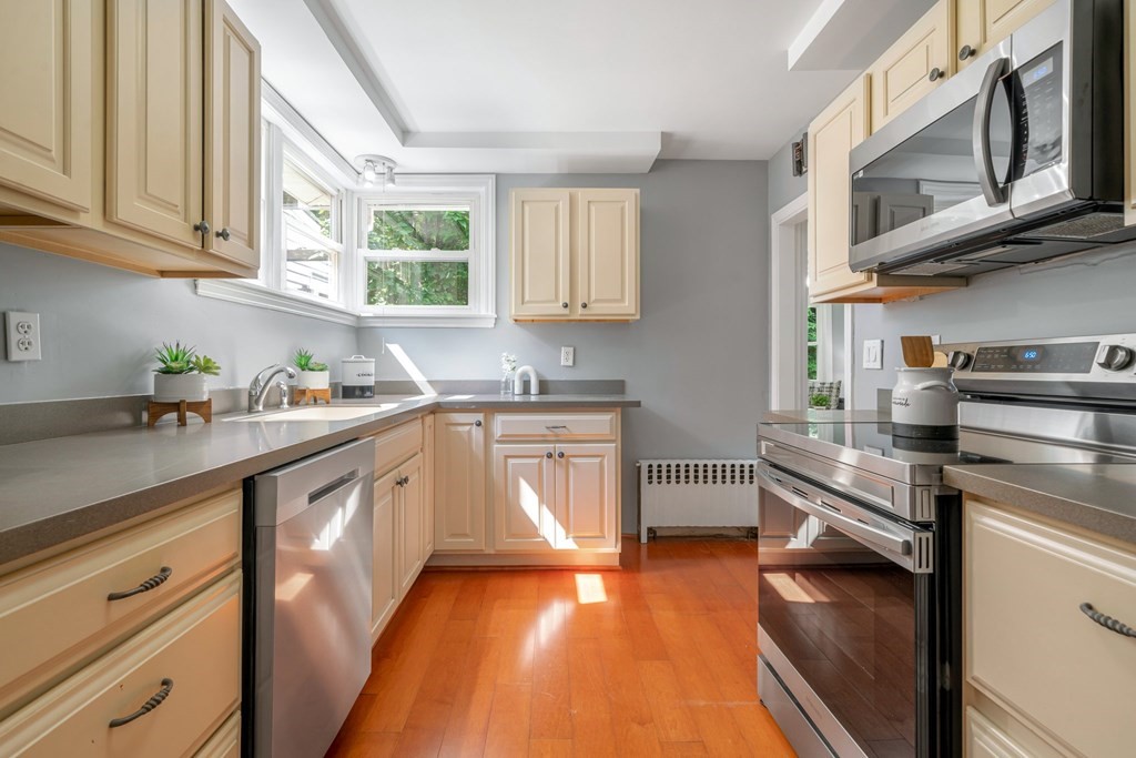 412 Worcester Road Barre, MA 01005 - Photo 10 of 31 a kitchen with stainless steel appliances granite countertop a sink a stove and cabinets