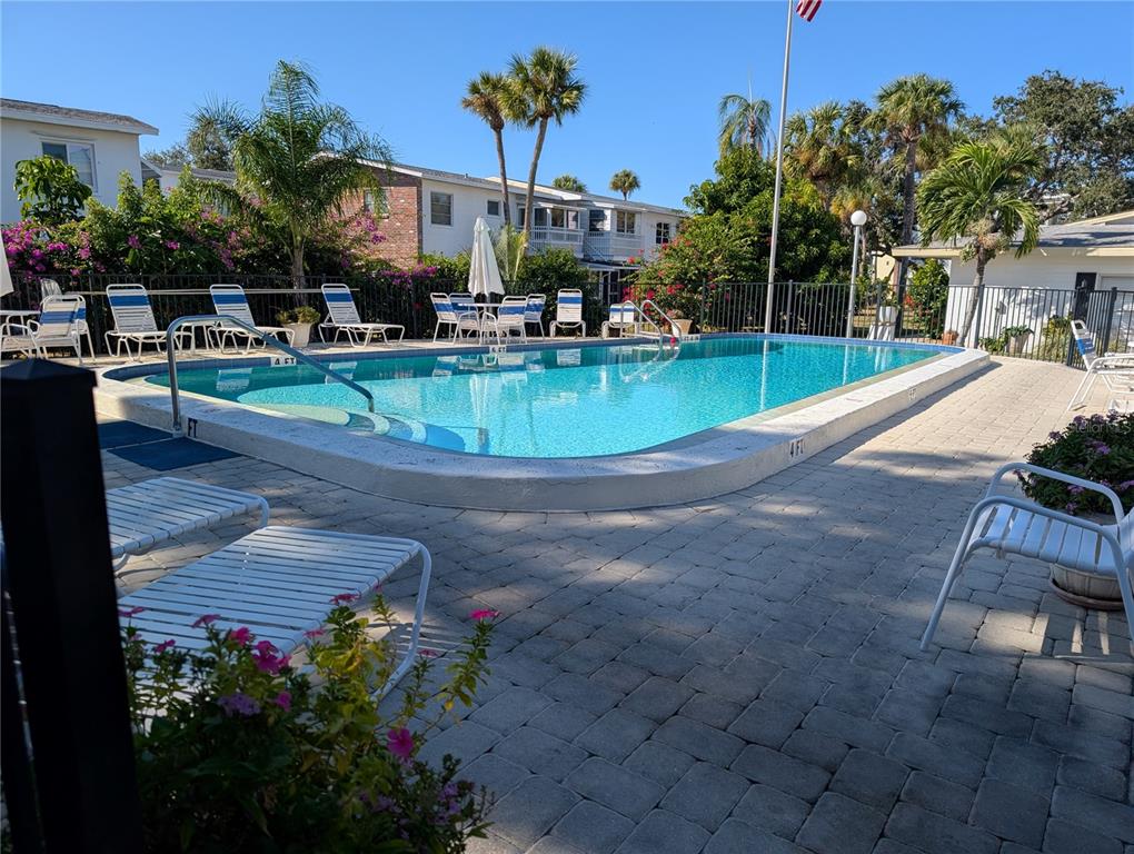 5929 Easy Street, Unit I23 Bradenton, FL 34207 - Photo 18 of 24 a view of a house with a patio