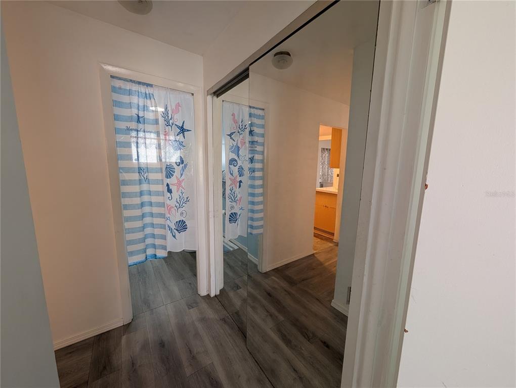 5929 Easy Street, Unit I23 Bradenton, FL 34207 - Photo 9 of 24 a view of wooden floor in a room