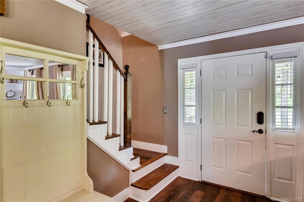 10840 Valley Hill Road Indian Land, SC 29707 - Photo 23 of 37 a very nice looking room with wooden floor and walls