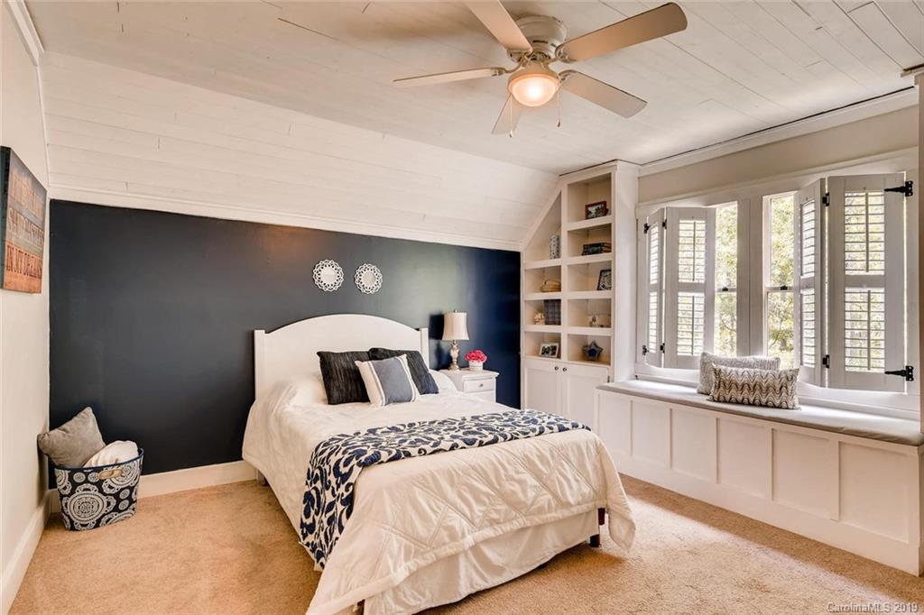 10840 Valley Hill Road Indian Land, SC 29707 - Photo 24 of 37 a bedroom with a large bed and a large window