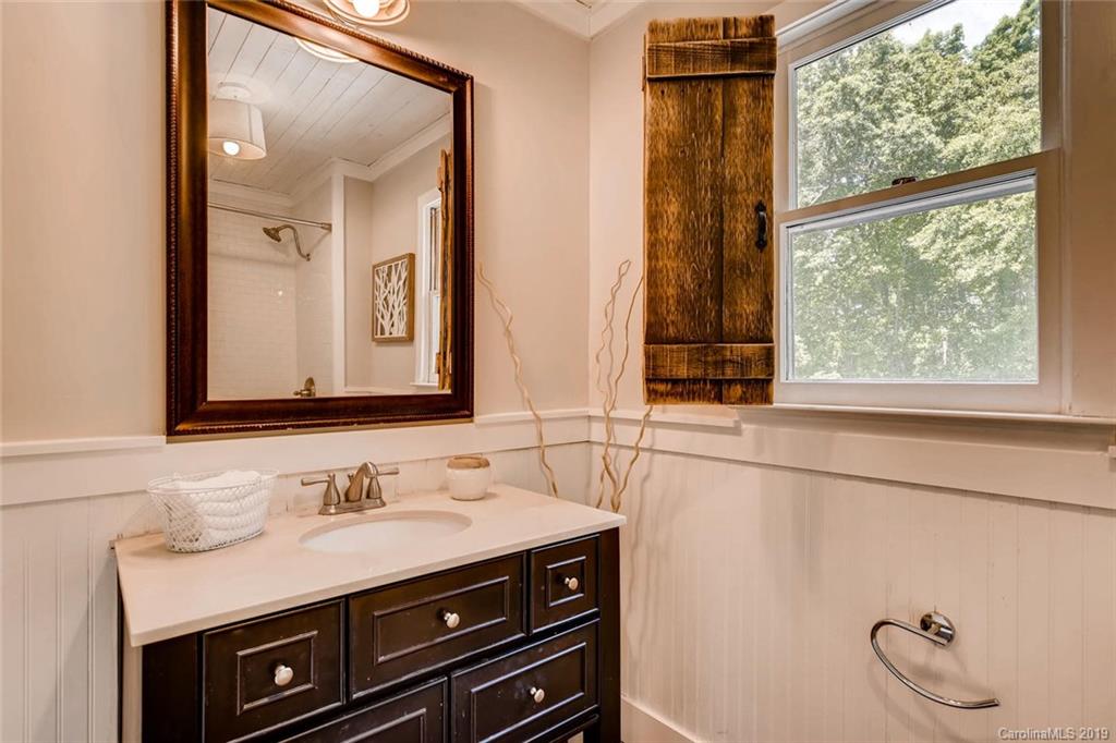 10840 Valley Hill Road Indian Land, SC 29707 - Photo 26 of 37 a bathroom with a sink and a mirror