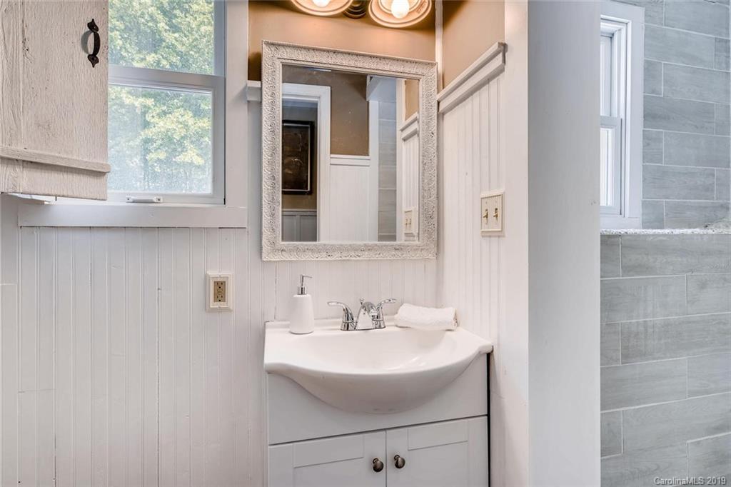 10840 Valley Hill Road Indian Land, SC 29707 - Photo 29 of 37 a bathroom with a sink and a mirror