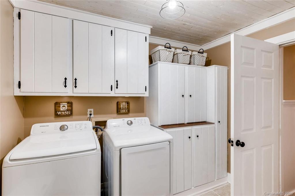 10840 Valley Hill Road Indian Land, SC 29707 - Photo 30 of 37 a view of storage and utility room with washer and dryer