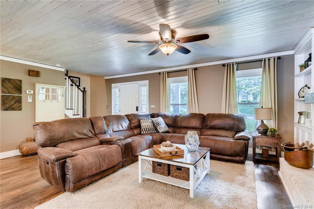 10840 Valley Hill Road Indian Land, SC 29707 - Photo 9 of 37 a living room with furniture ceiling fan and a window