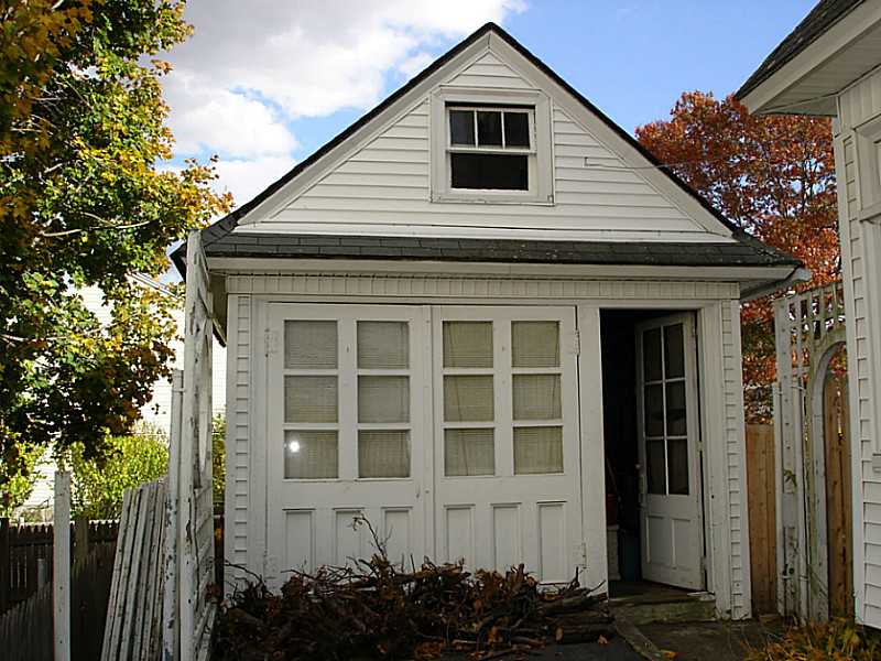 492 Providence Street Woonsocket, RI 02895 - Photo 5 of 24 Parking Lot/Garage. Garage with loft