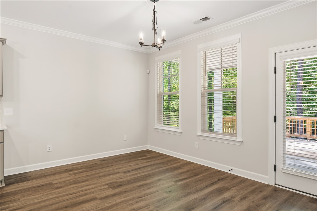 701 Weathered Oak Way Anderson, SC 29621 - Photo 8 of 41 This bright space features natural light and direct outdoor access, perfect for relaxed living.