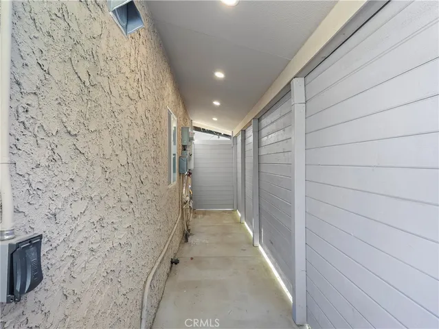 a bathroom with a shower and a sink