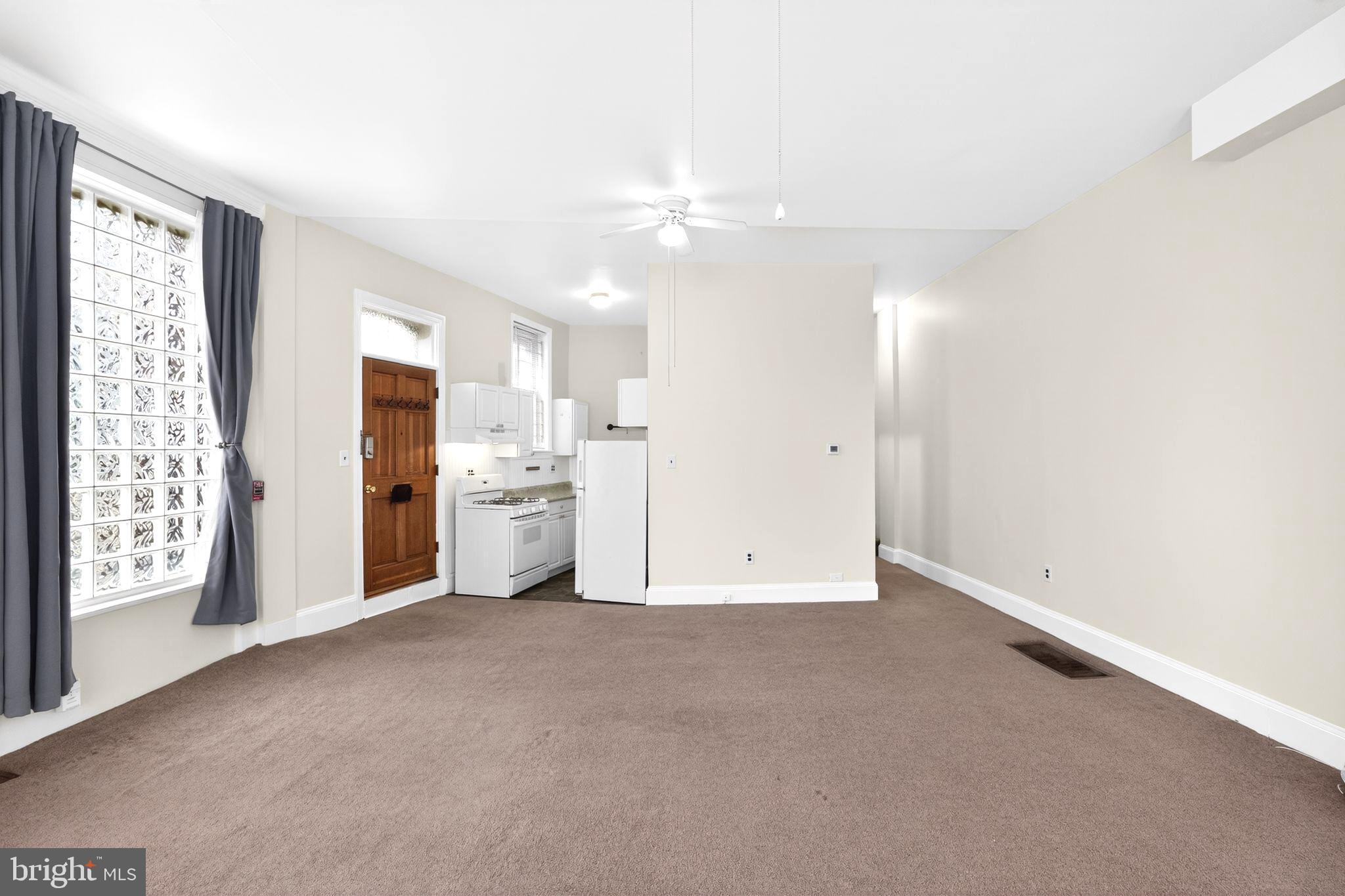 4417 Baker Street Philadelphia, PA 19127 - Photo 4 of 50 a view of an empty room with a window