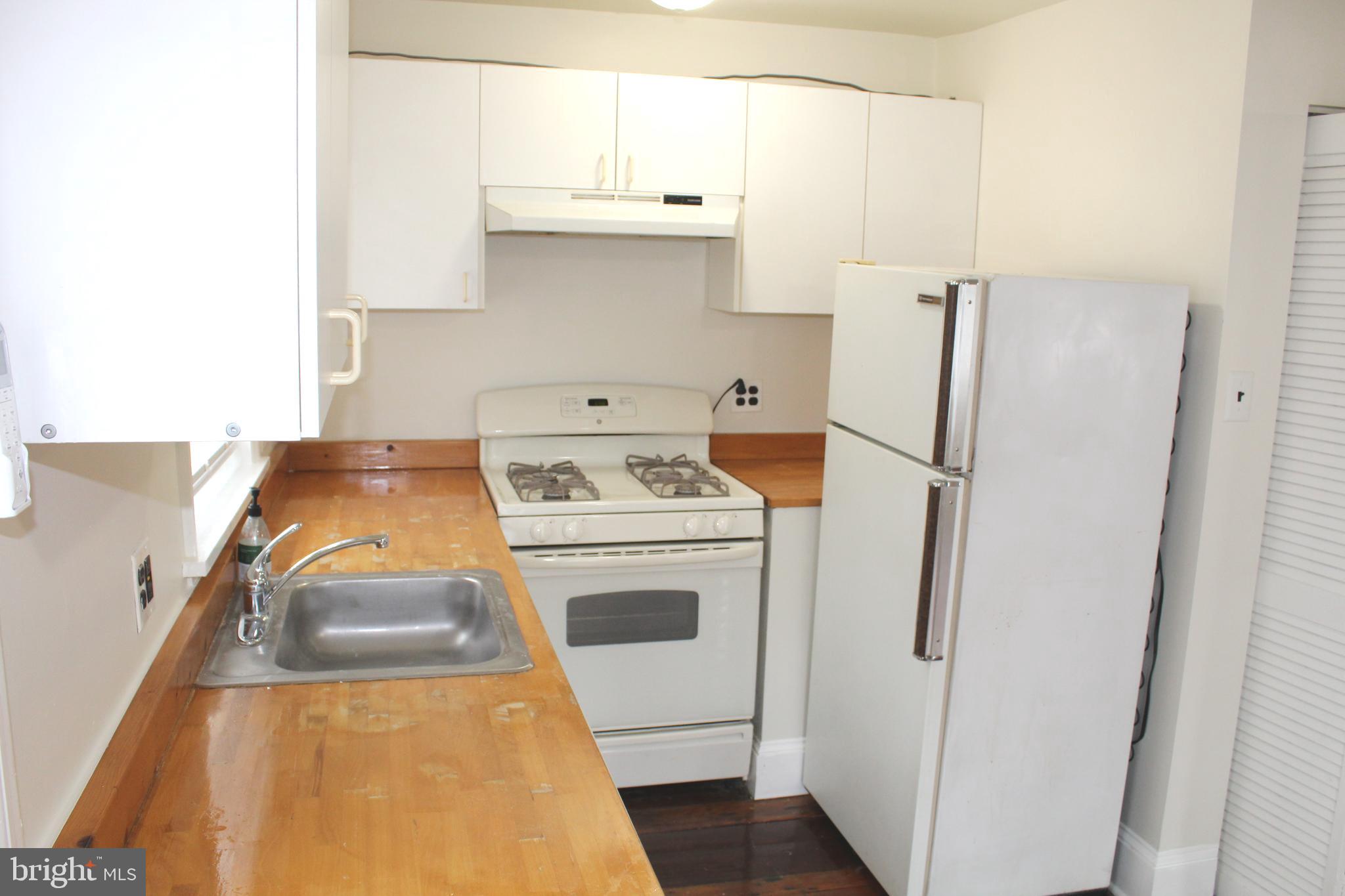 4417 Baker Street Philadelphia, PA 19127 - Photo 44 of 50 a utility room with dryer and washer
