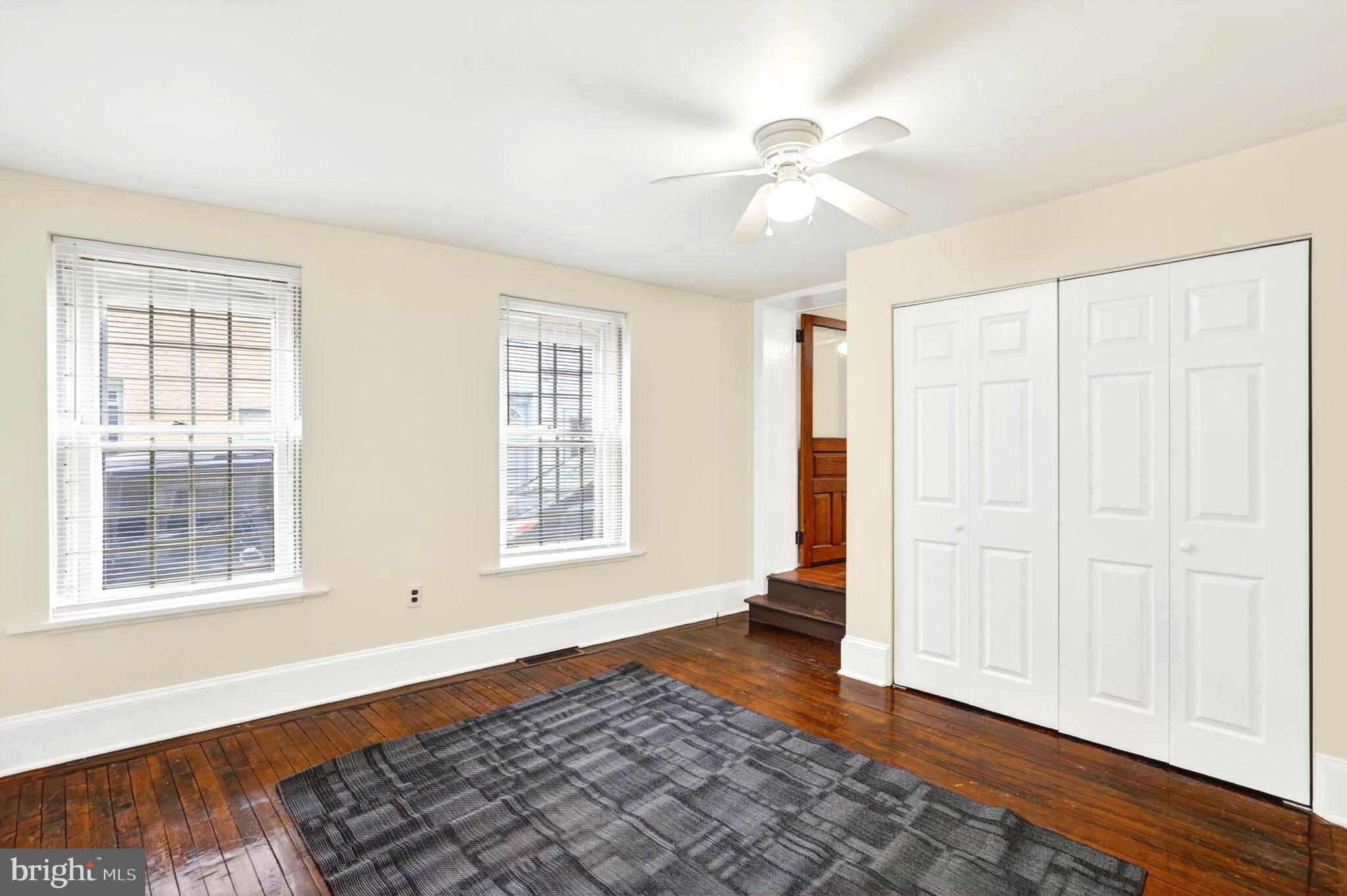 4417 Baker Street Philadelphia, PA 19127 - Photo 10 of 50 a view of an empty room with a window and wooden floor