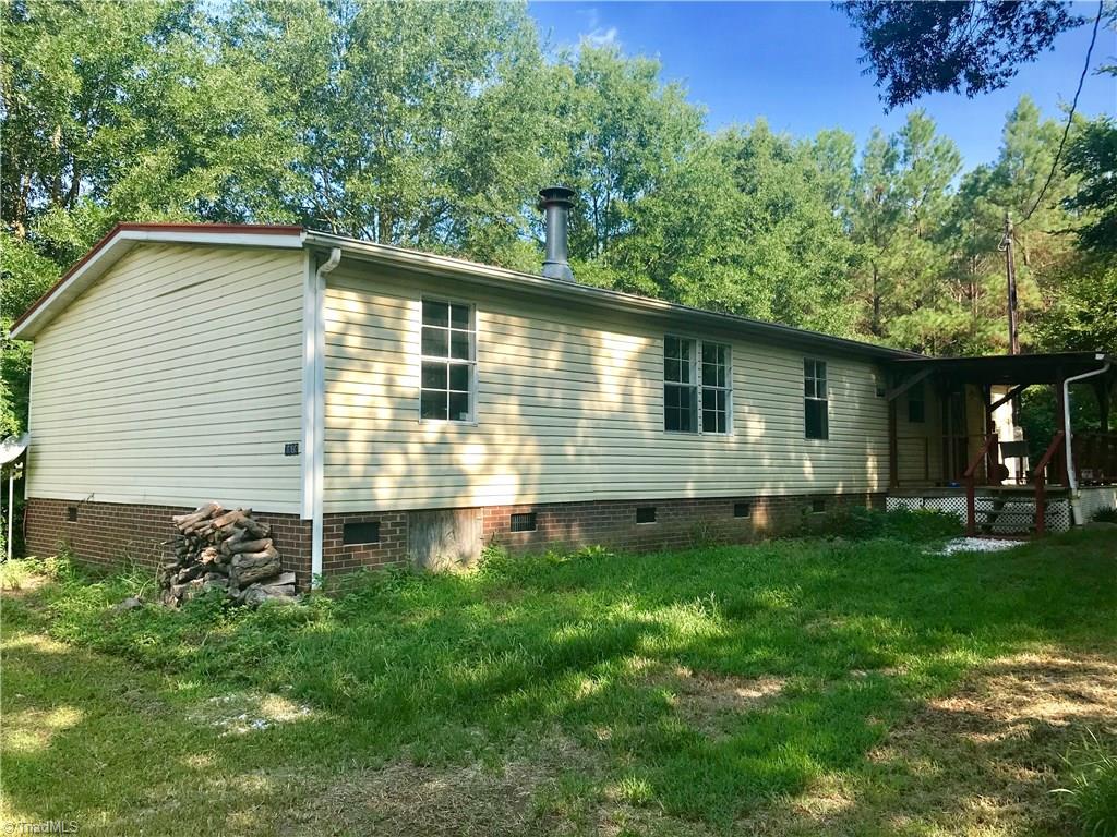 7797 Howard Mill Road Bennett, NC 27208 - Photo 2 of 16 Rear view of home