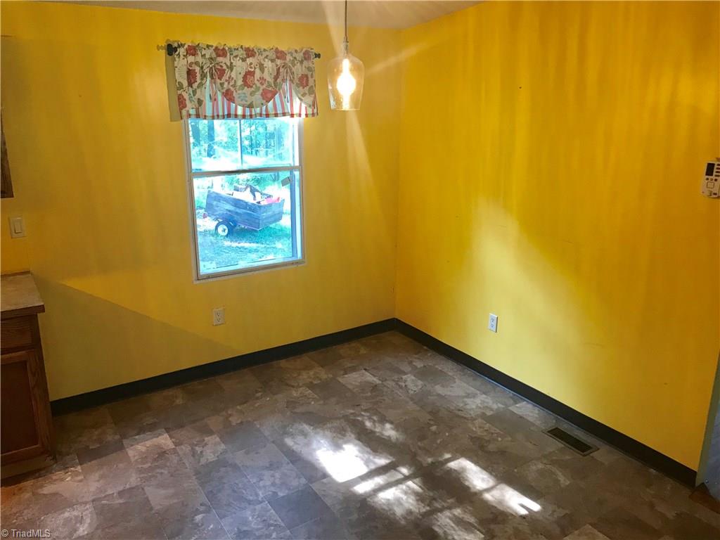 7797 Howard Mill Road Bennett, NC 27208 - Photo 5 of 16 Dining room