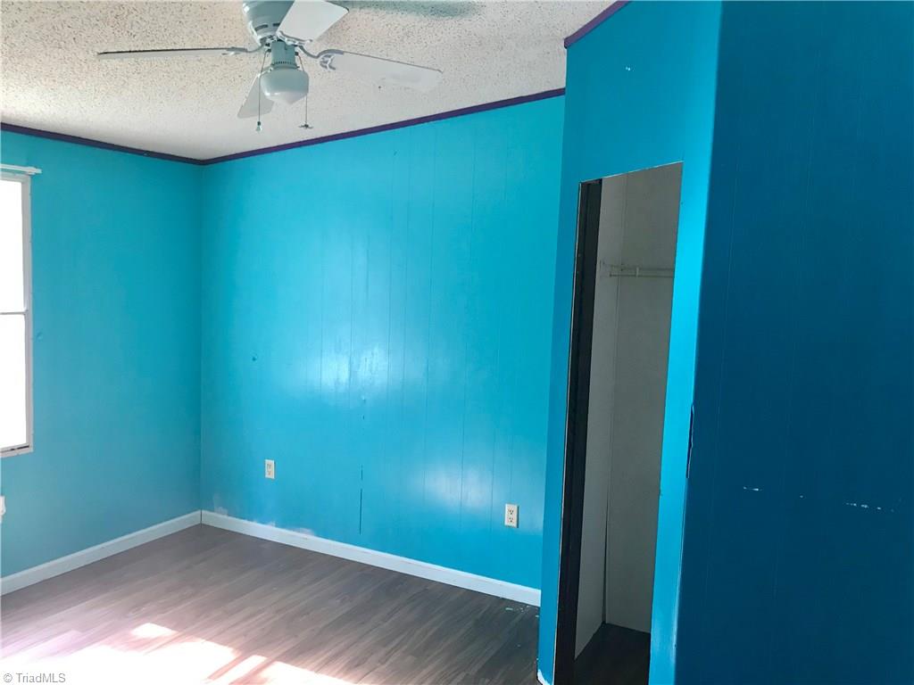 7797 Howard Mill Road Bennett, NC 27208 - Photo 10 of 16 2nd bedroom