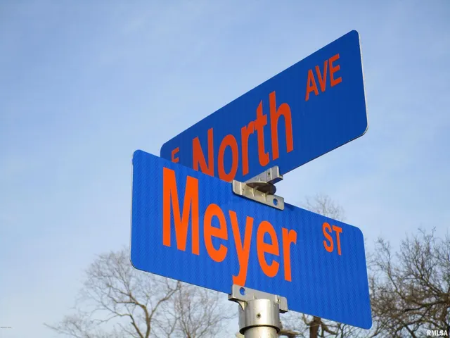 a street sign that is on a pole