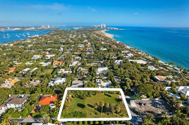 an aerial view of residential building with parking space